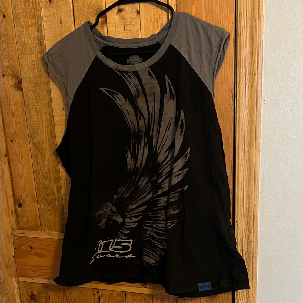 Ladies, Harley Davidson, cut off sleeve T-shirt 115 years.